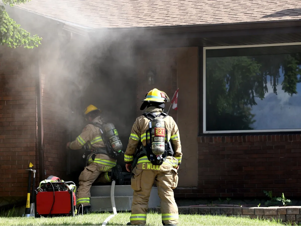 Three escape northwest Calgary house fire with their dogs
