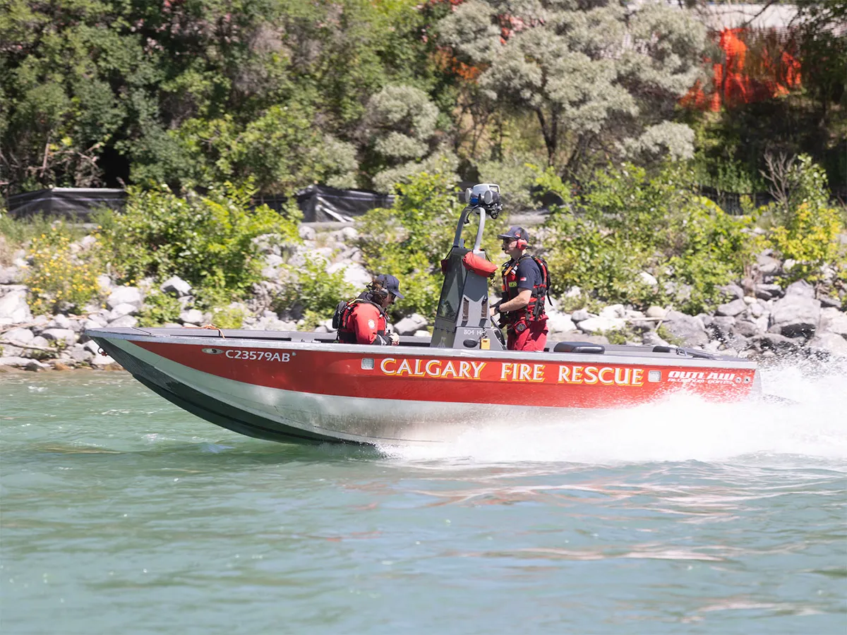 Three paddleboarders rescued from swollen Bow River
