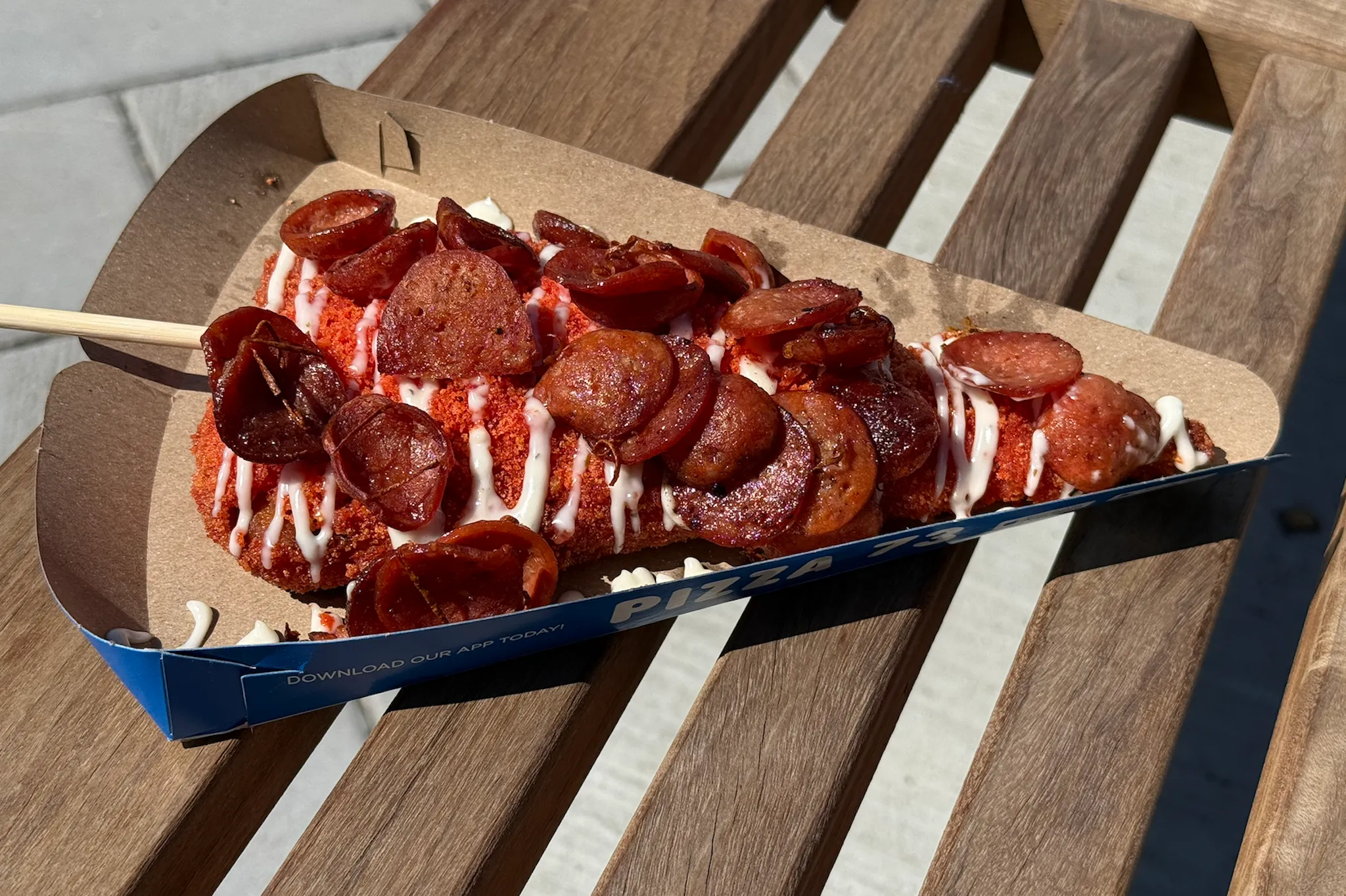 Calgary Stampede Midway food tasting finds ramen donuts soggy but fried pizza genuinely good
