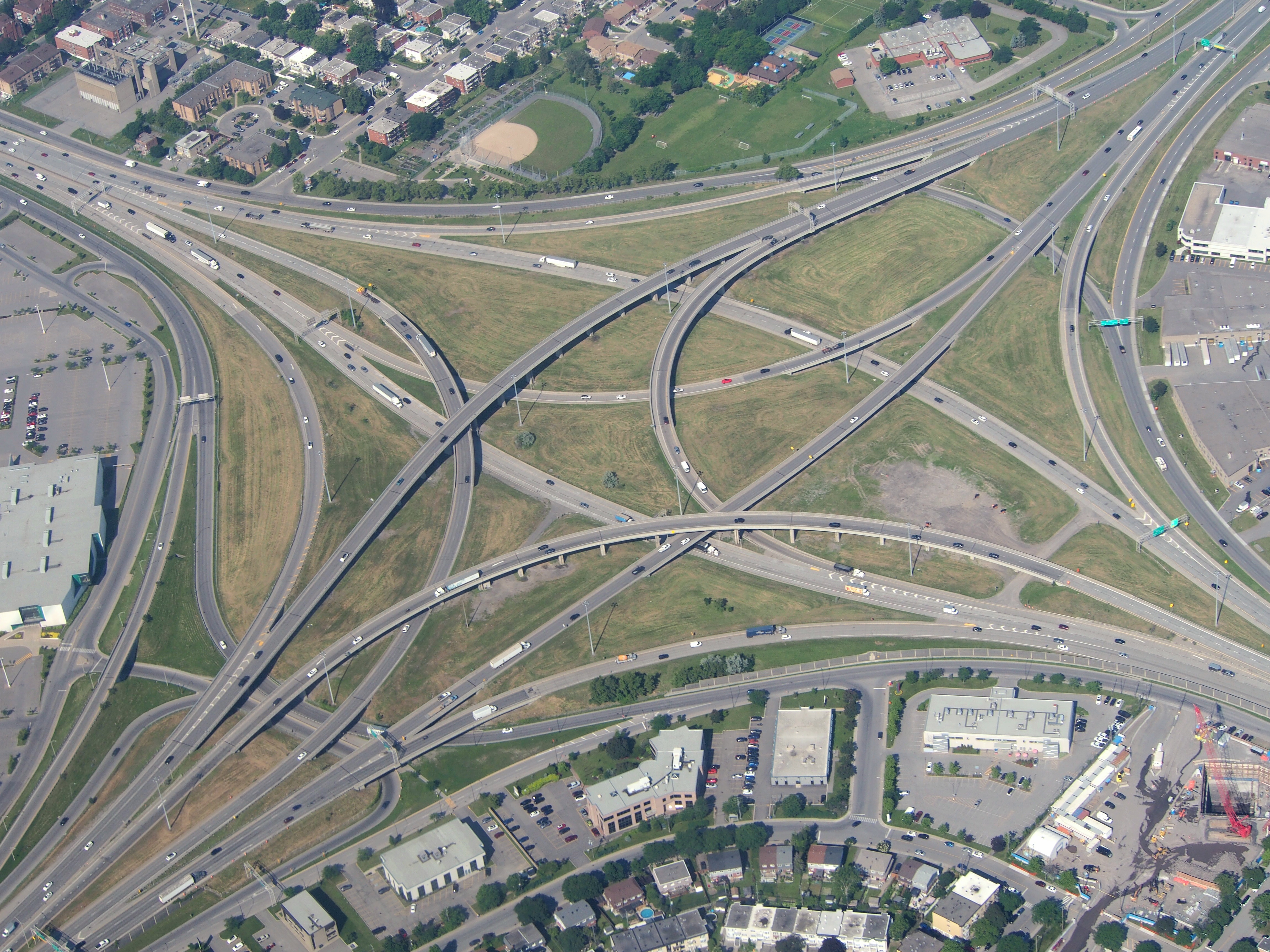 Two men hospitalized after shooting near Anjou interchange; investigation ongoing