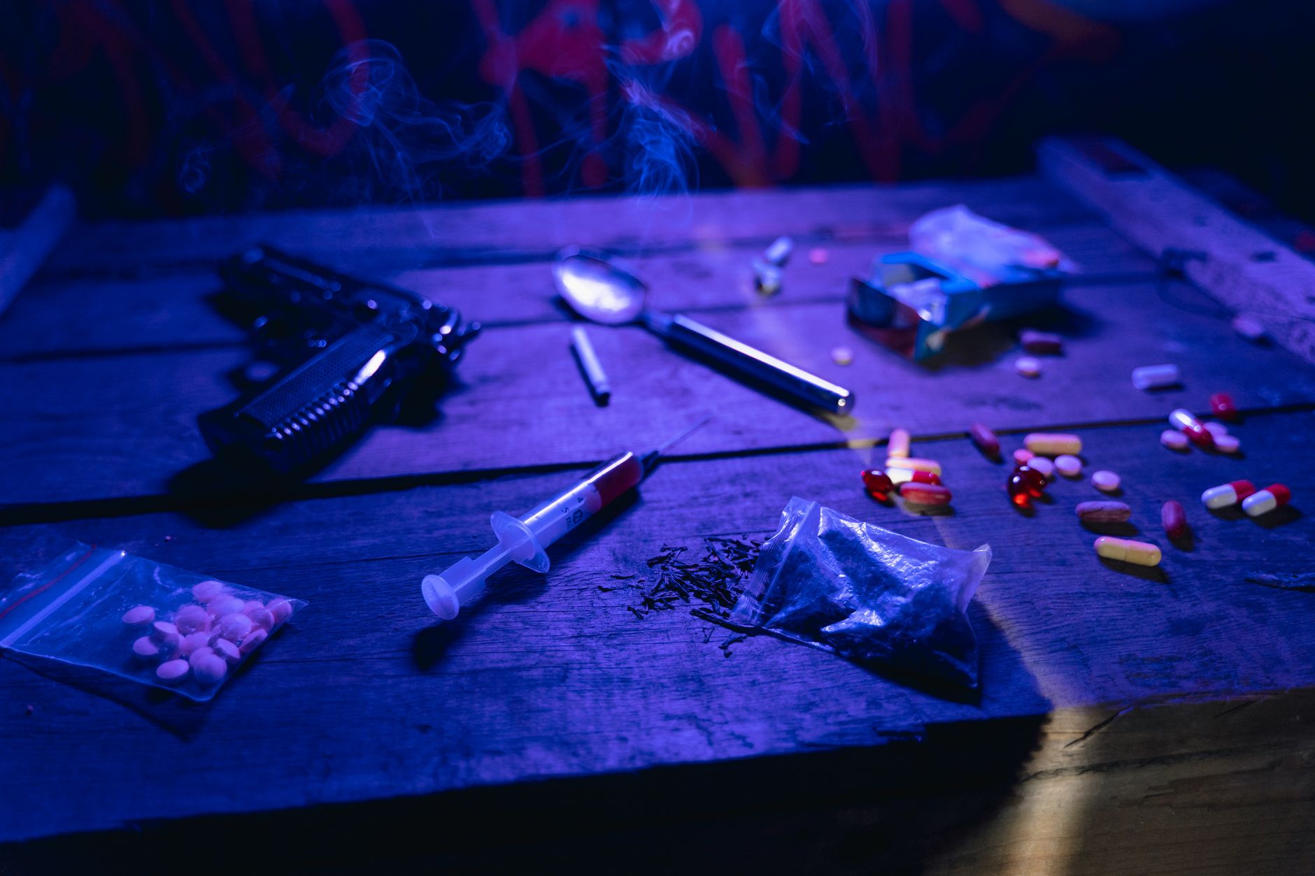 Three charged in major drug trafficking bust that seized two handguns and over $60,000 in cocaine