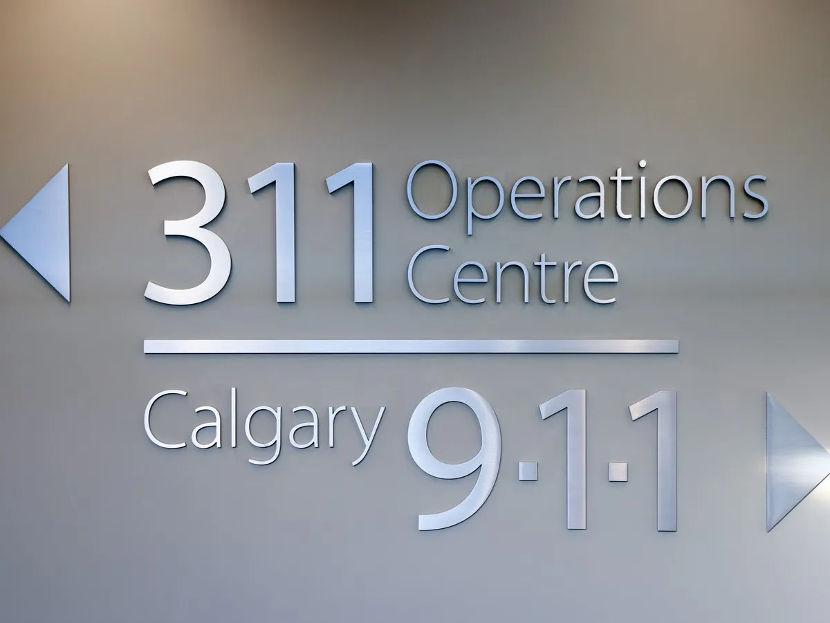 Calgary 911 dispatcher charged with breaching trust over confidential data sharing