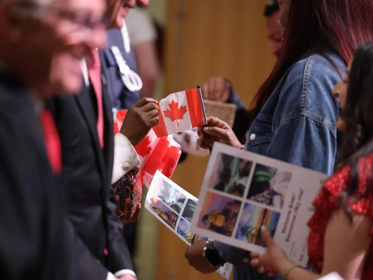 125 people sworn in as Canadian citizens at Central Library on Canada Day