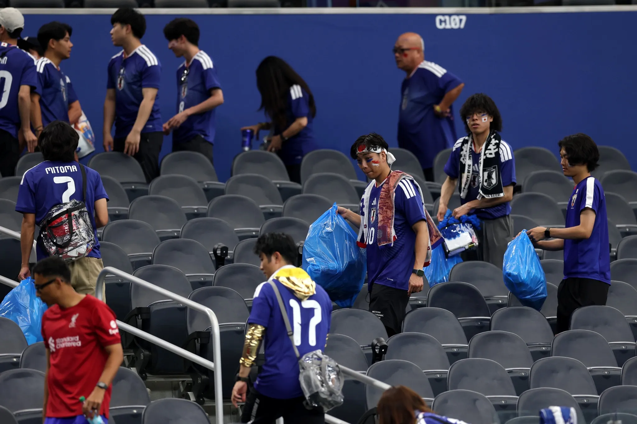 Japan's World Cup fans clean stadium after match—a 28-year tradition