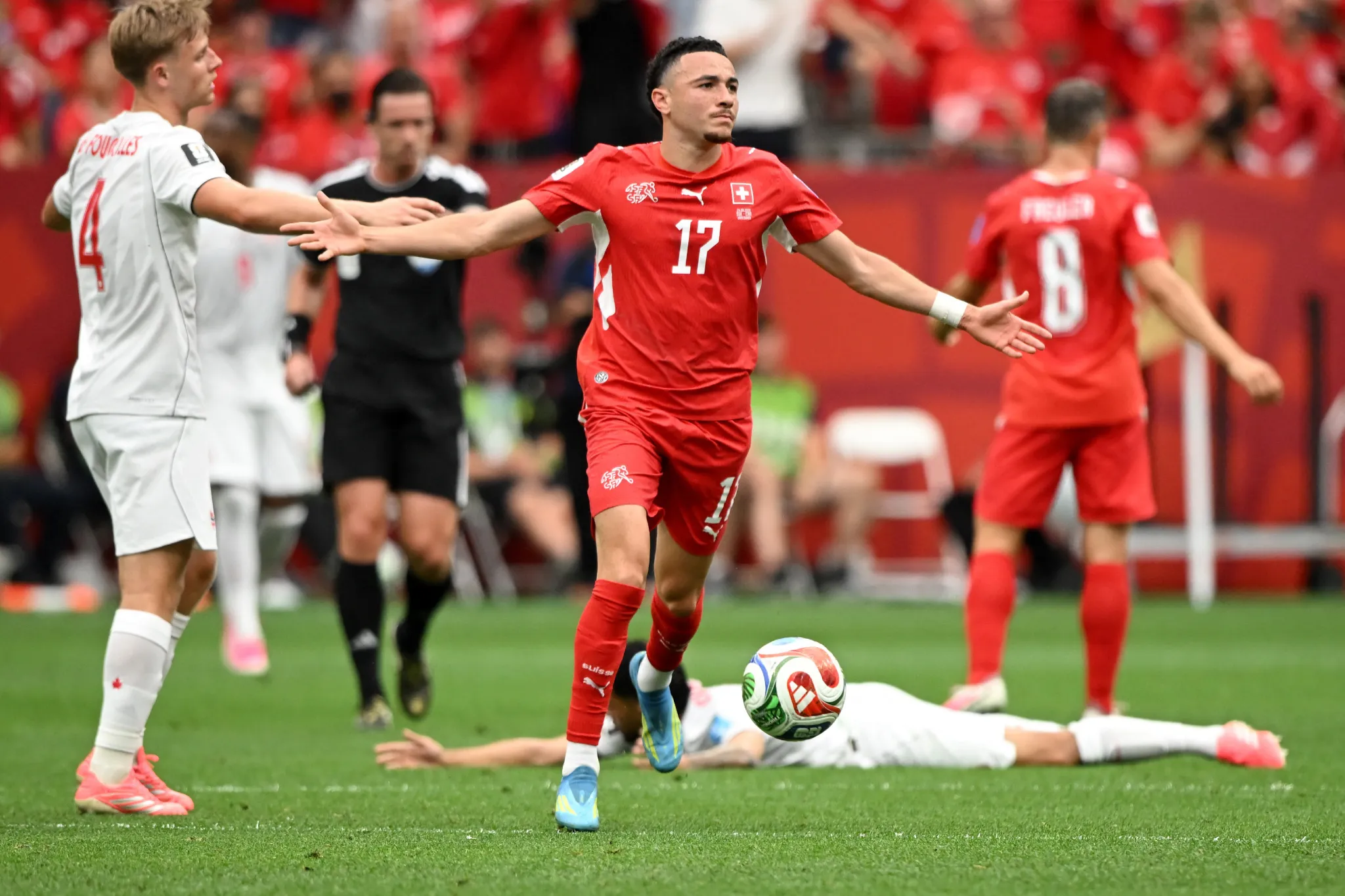 Canada advances to World Cup Round of 32 despite loss to Switzerland