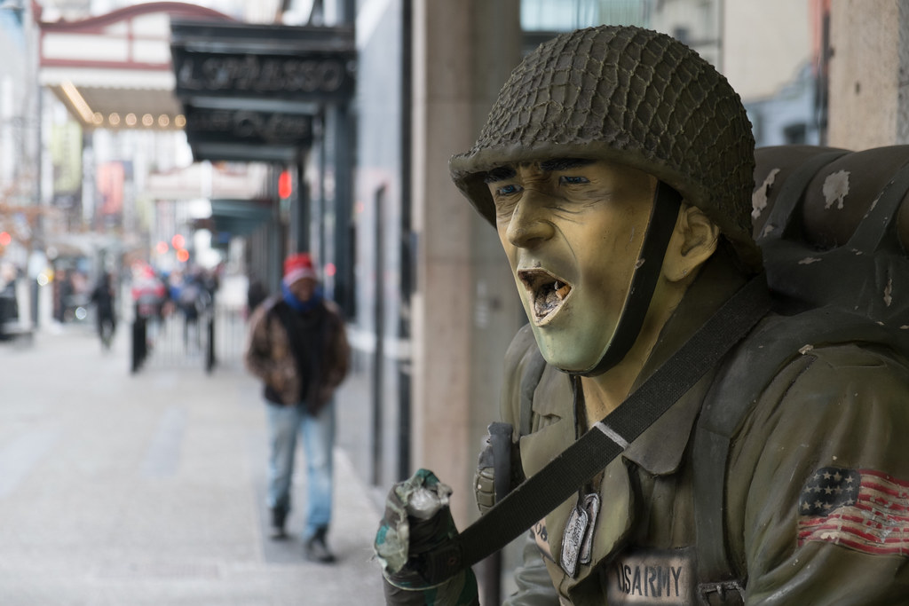 One suspect charged, one at large after five-inch slash on Granville Street