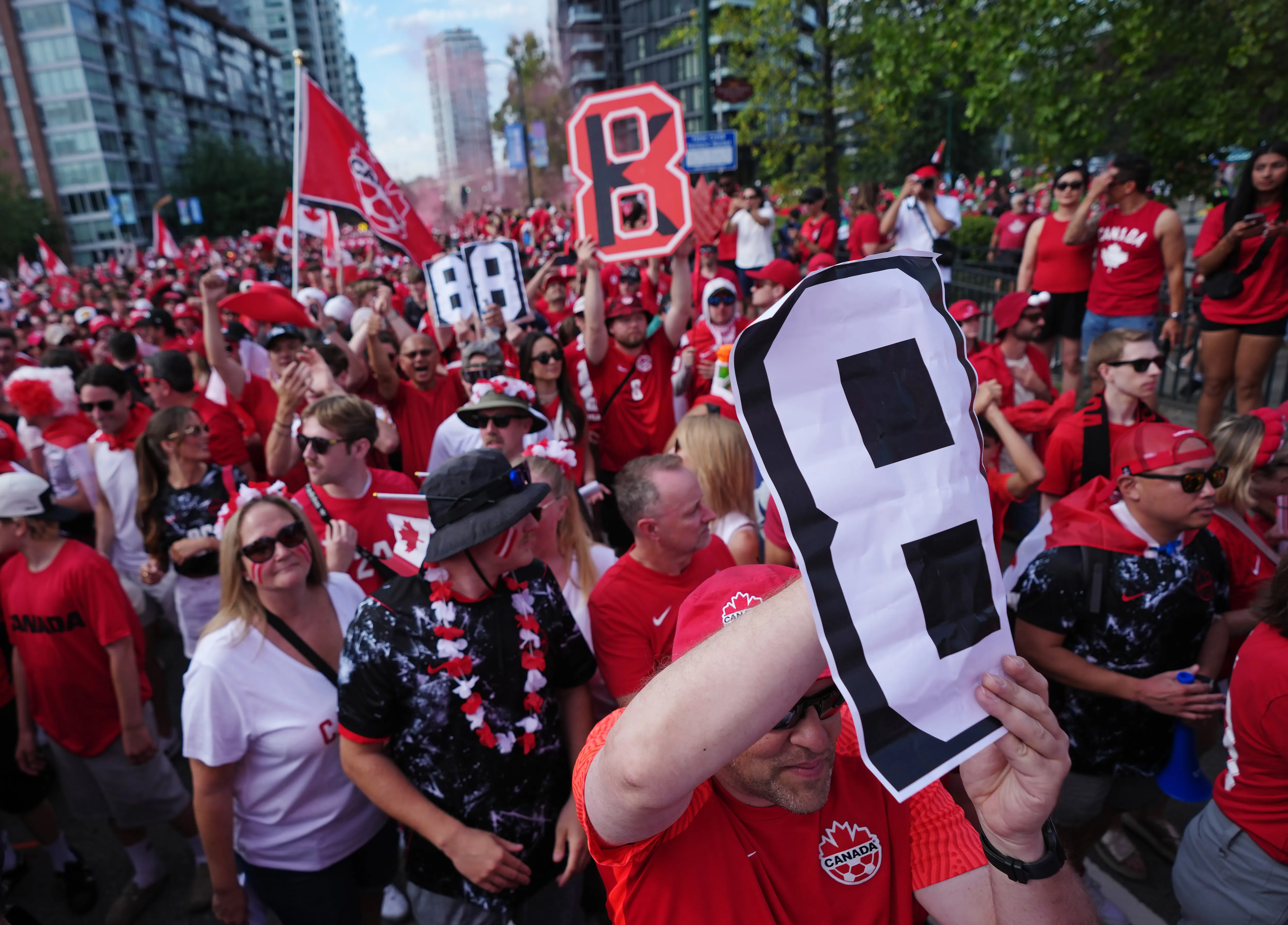 Canada loses to Switzerland 2-1 but advances to World Cup knockouts