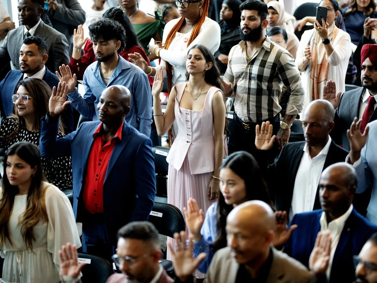 Fifty people from 21 countries become Canadian citizens at special Canada Day ceremony in Edmonton