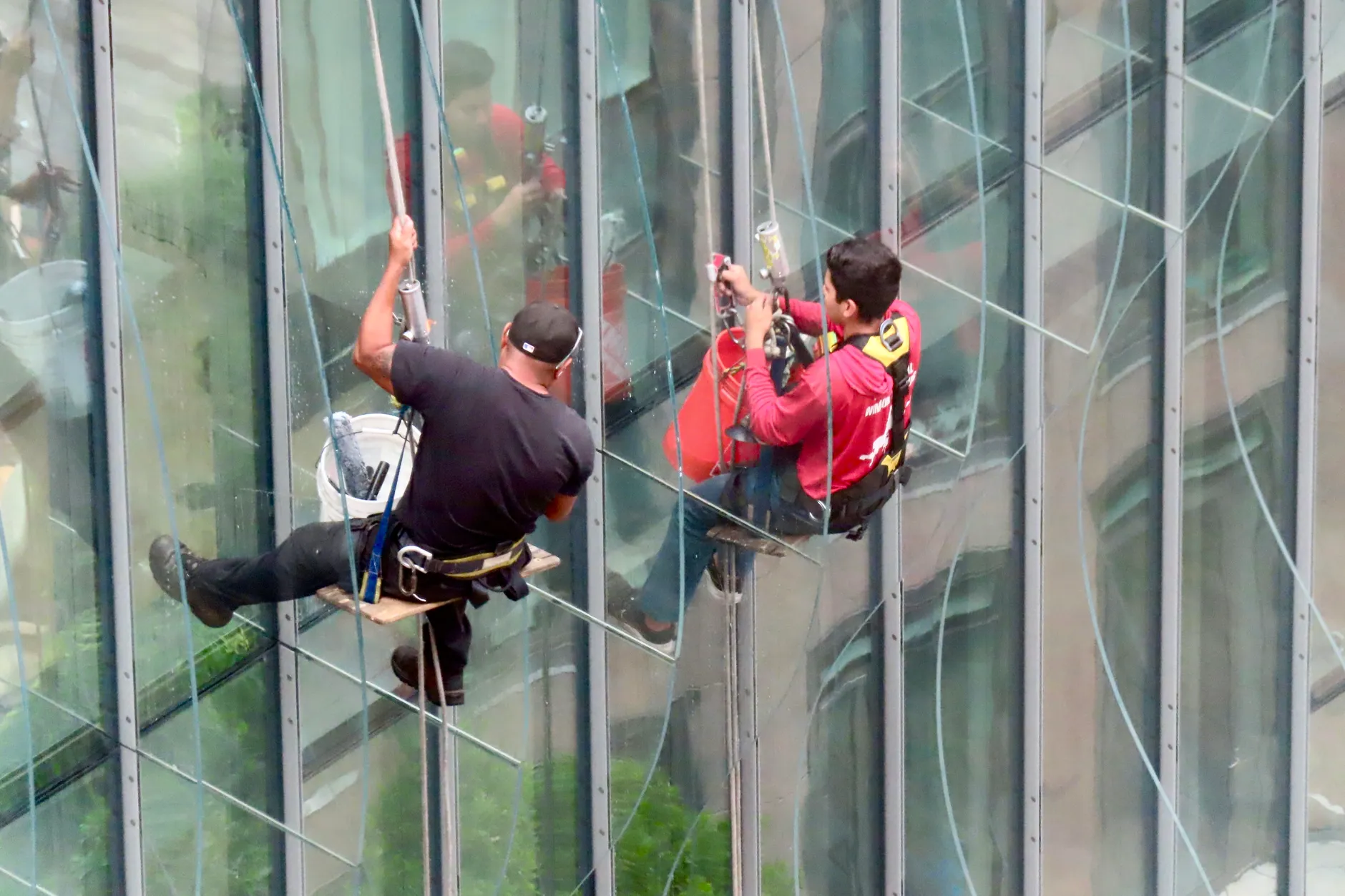 Window-washing platform malfunction leaves two workers dangling 14 storeys above downtown Montreal