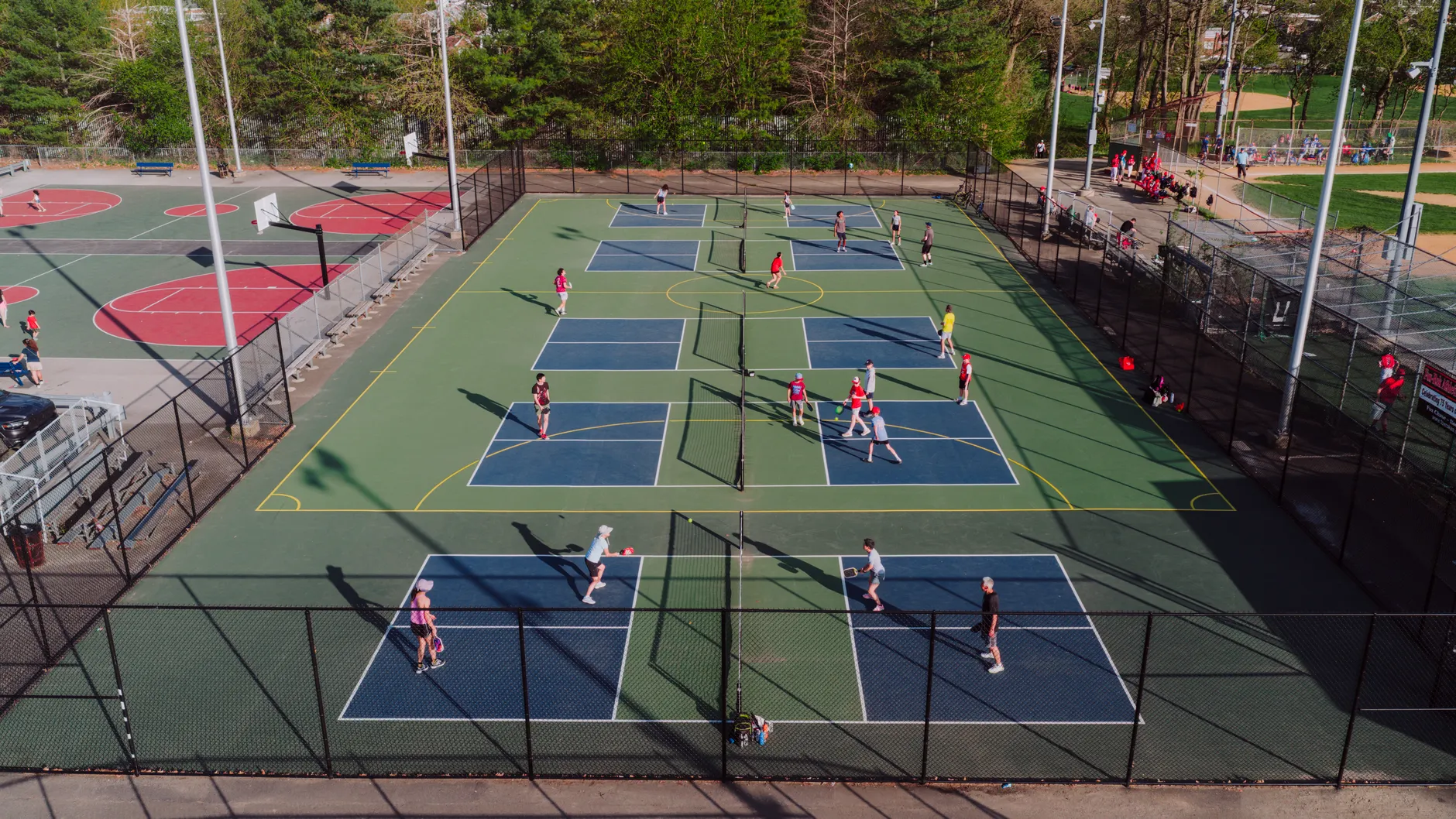 Tennis and pickleball players locked in court fight nationwide; experts say build more courts