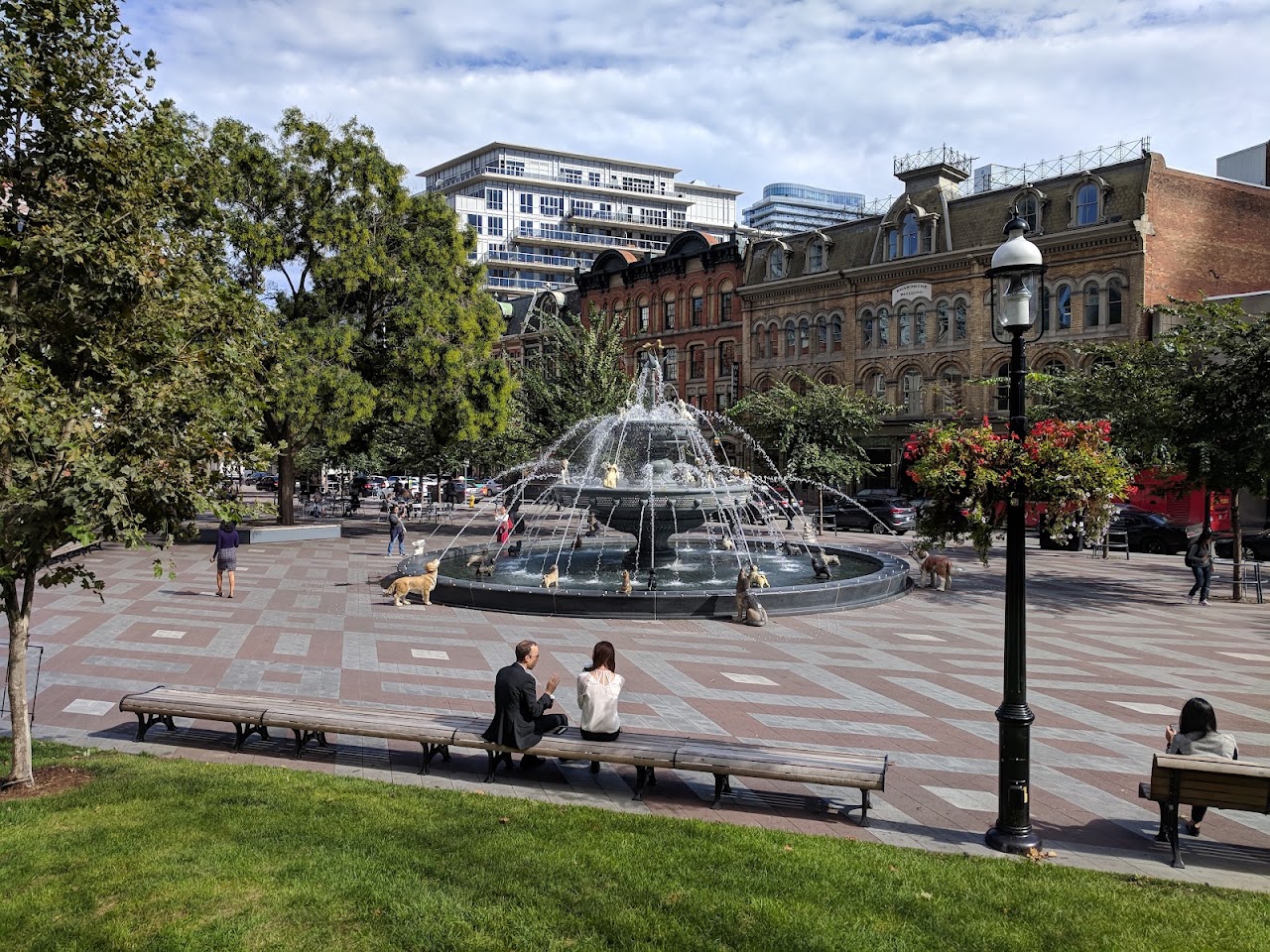 Adults gather at Berczy Park for free giant water gun fight Saturday