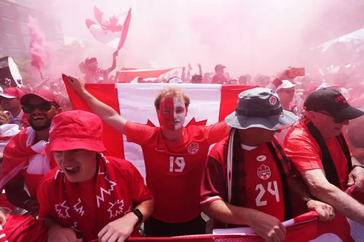 Canada's World Cup Supporters Electrify Major Marches