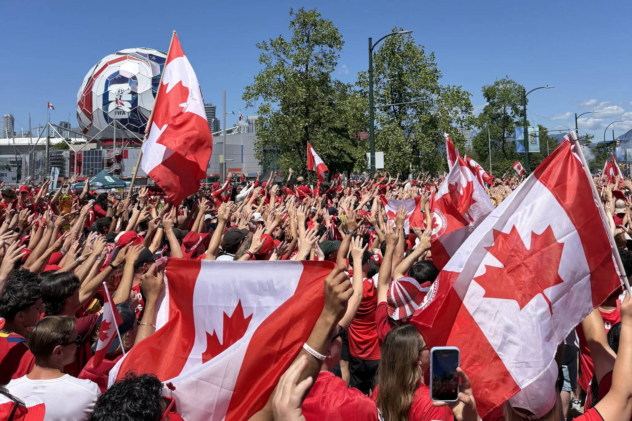 Thousands march to BC Place as Canada faces Qatar in World Cup